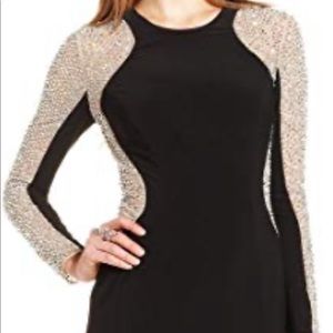 Xscape black,nude &silver dress